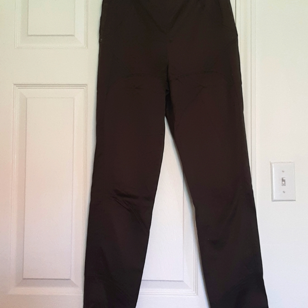Olive/brown Gucci slender pant. Zipper on both sides of hips about 6 inches long